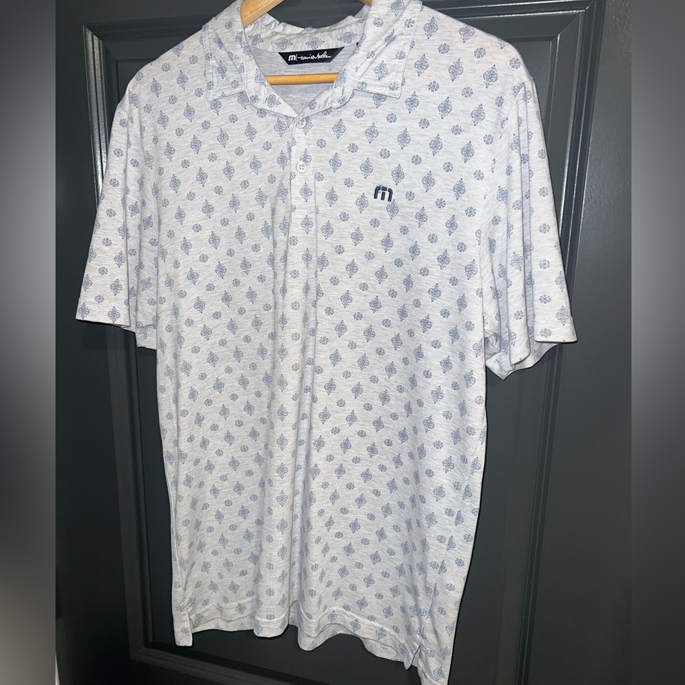 Travis Mathew White and Blue Polo Shirt with Geometric Pattern